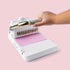 Lifestyle image of We R Makers Universal Cinch Book Binding Machine being used
